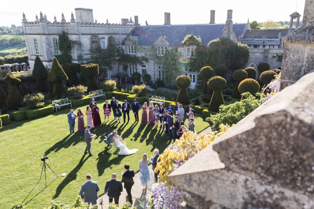 104 guests watching bride grooms garden game euridge manor chippenham oxfordshire wedding photographer