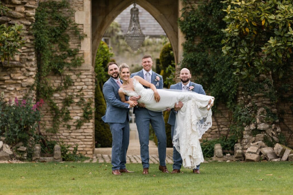 108 groomsmen lift bride euridge manor gardens chippenham wiltshire oxford wedding photographers