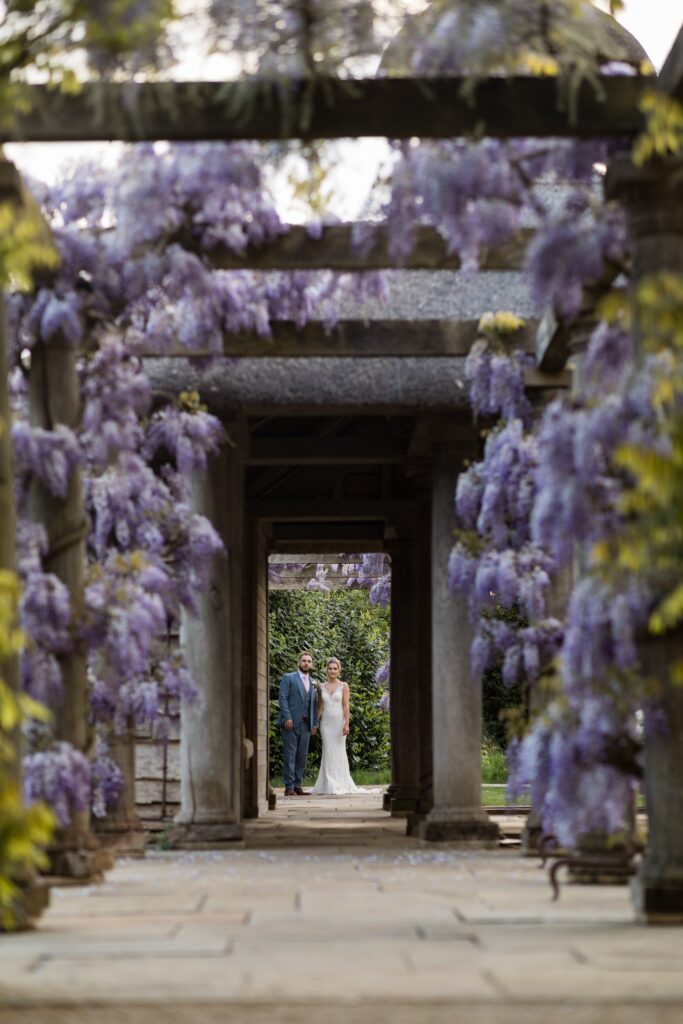 123 bride groom hold hands euridge manor wysteria garden chippenham wiltshire oxfordshire wedding photographers