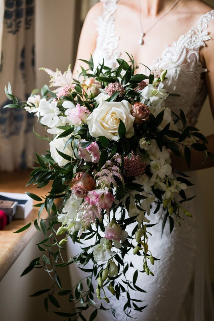 42 bride holds bouquet euridge manor chippenham wiltshire oxford wedding photographers