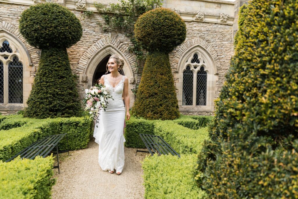 43 bride carries bouquet euridge manor chippenham wiltshire oxford wedding photography