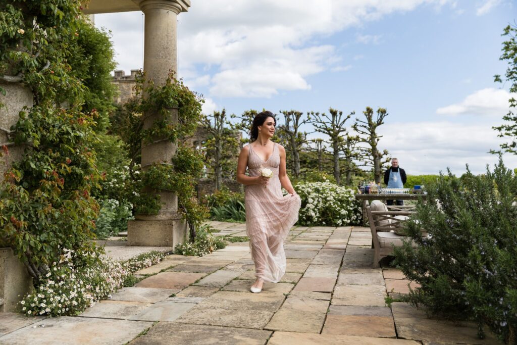 45 bridesmaid carries rose euridge manor terrace chippenham wiltshire oxfordshire wedding photographers