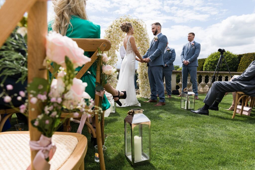 56 bride groom exchange vows euridge manor outdoor ceremony chippenham wiltshire oxfordshire wedding photographer