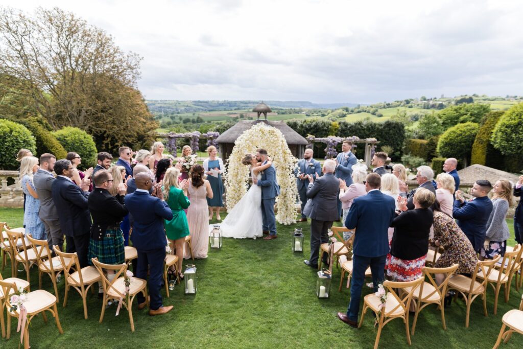 59 bride groom kiss euridge manor outdoor ceremony chippenham wiltshire oxford wedding photographer