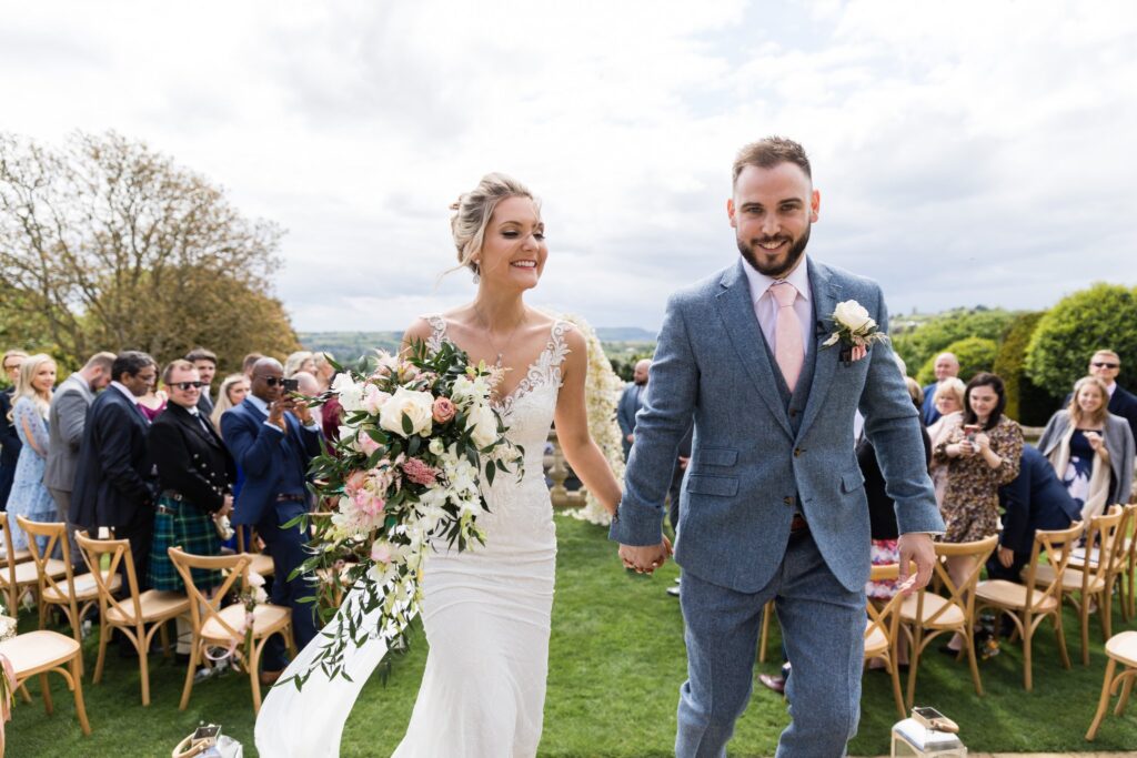 60 bride grooms aisle walk euridge manor outdoor ceremony chippenham wiltshire oxford wedding photographers