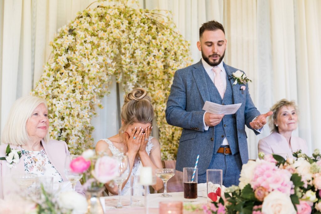 92 bride covers face euridge manor grooms speech chippenham oxfordshire wedding photographer