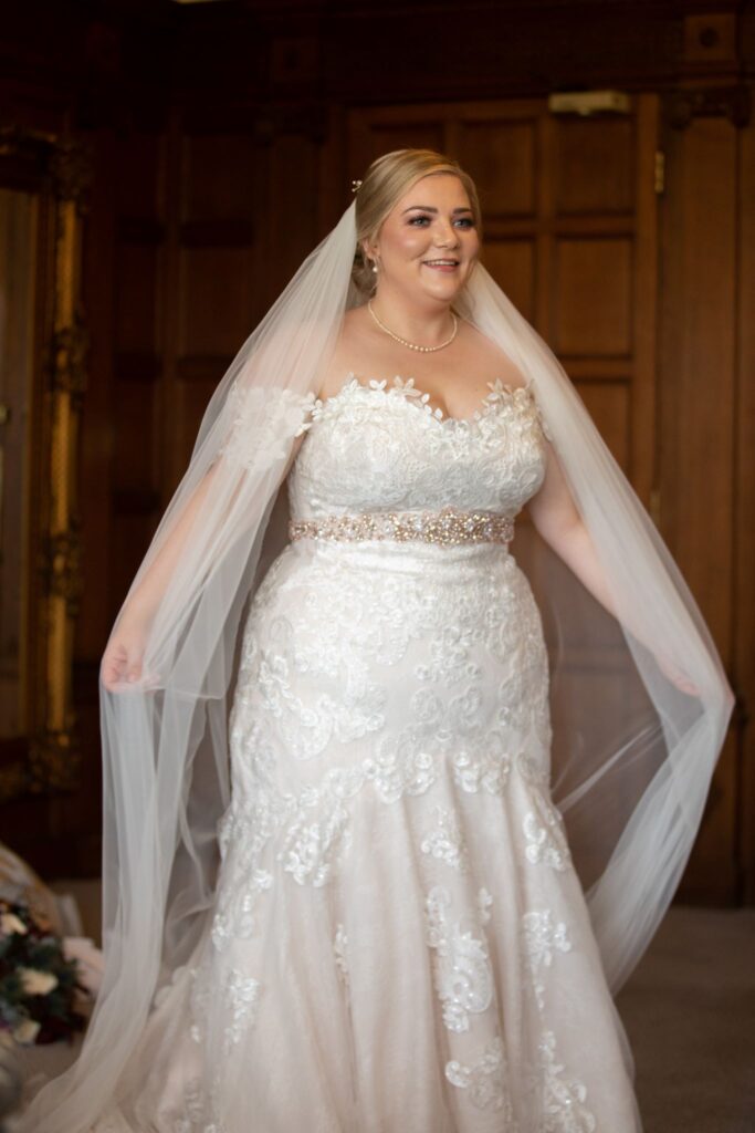 04 bride displays veil rushpool hall saltburn-by-the-sea oxford wedding photographer