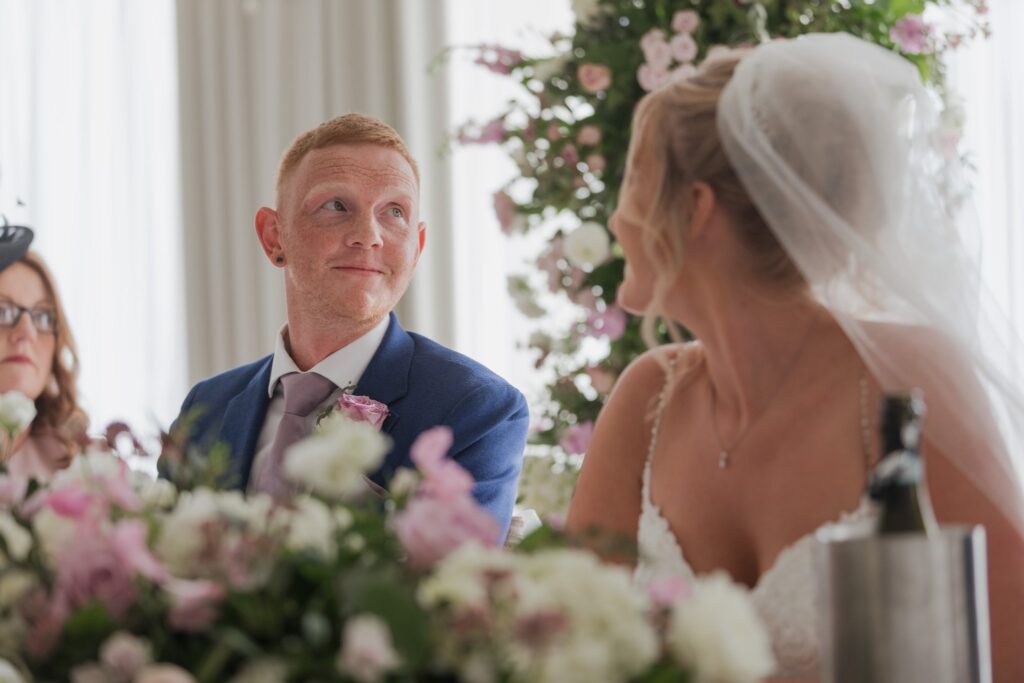 104 groom enjoys top table speech cotswolds hotel golf & spa chipping norton oxfordshire wedding photographer