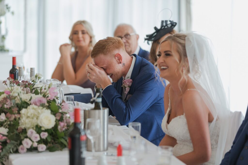 110 embarassed groom hears bestmans speech cotswolds hotel golf & spa chipping norton oxfordshire wedding photographer