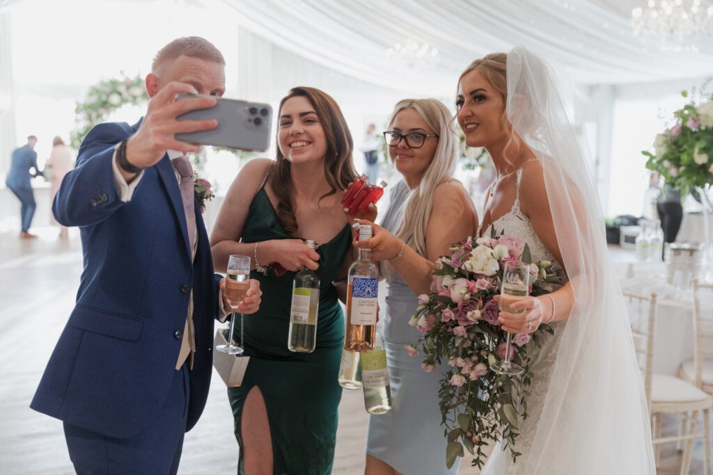 125 groom takes selfie photograph cotswolds hotel golf & spa oxfordshire wedding photographers