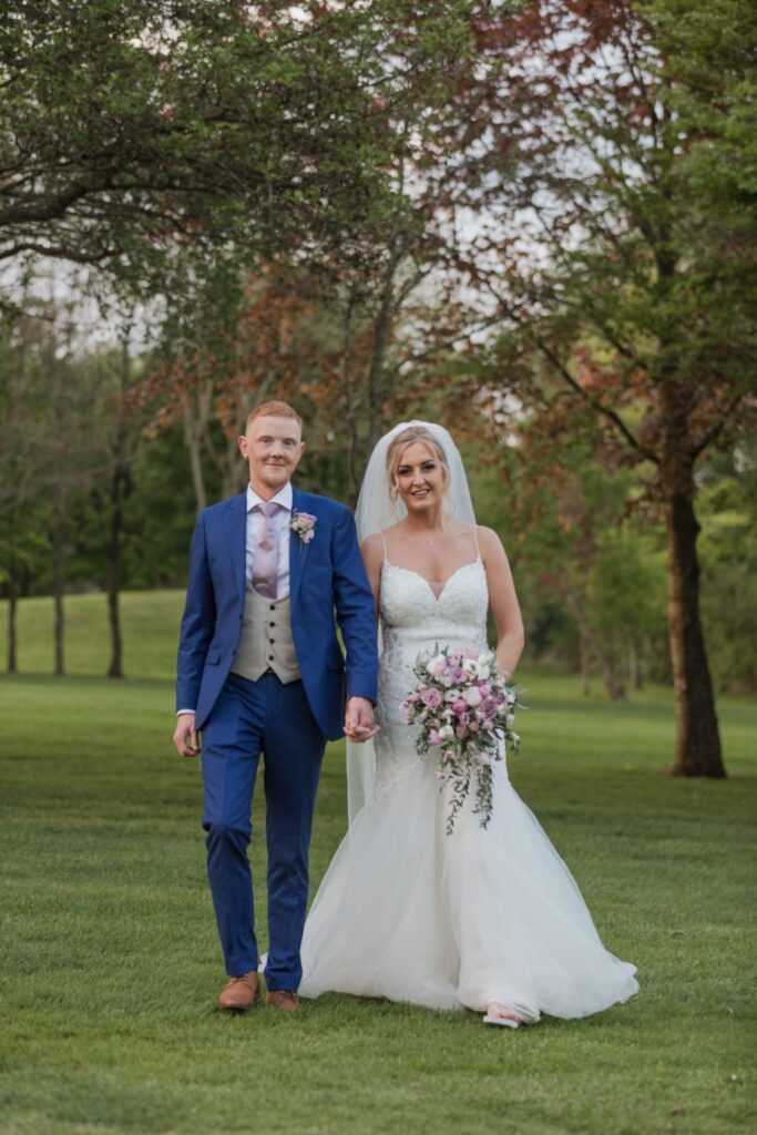 133 bride groom walking alone cotswolds hotel golf course oxford wedding photographer