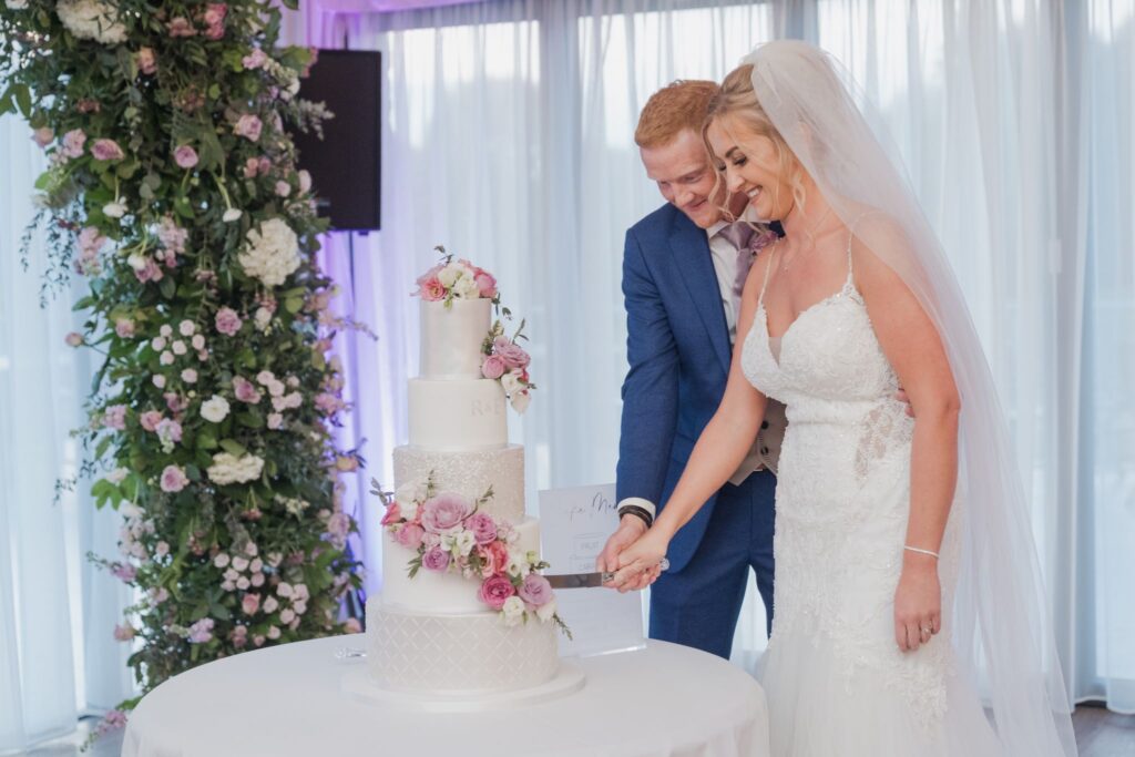 141 cake cutting ceremony cotswolds hotel golf & spa chipping norton oxford wedding photographer