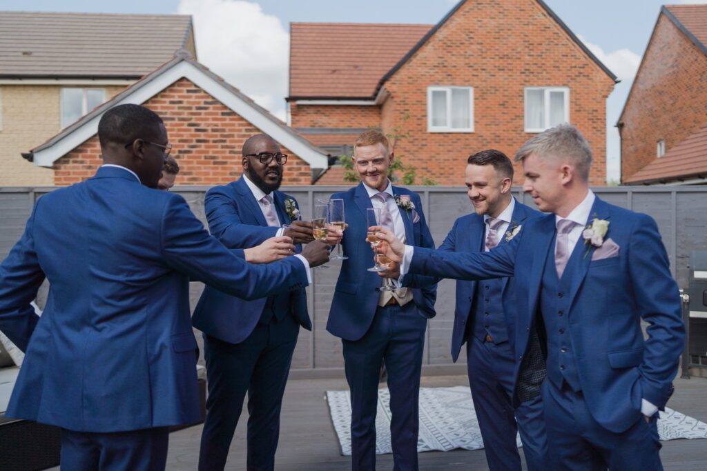 15 grooms champagne toast groom prep oxford oxfordshire wedding photographers