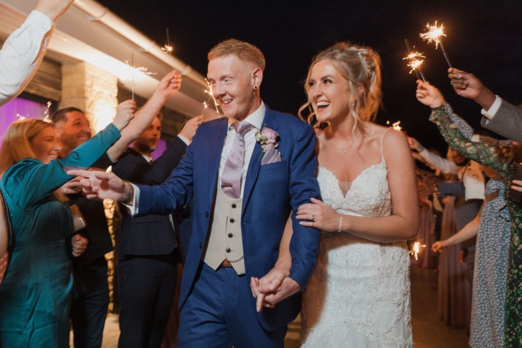 162 laughing bride groom enjoy sparklers parade cotswolds hotel golf & spa chipping norton oxford wedding photographer