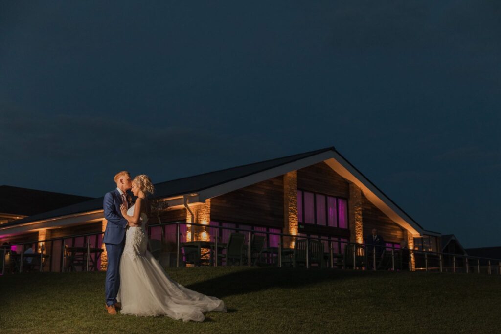 163 bride grooms twilight kiss cotswolds hotel chipping norton oxford wedding photographers