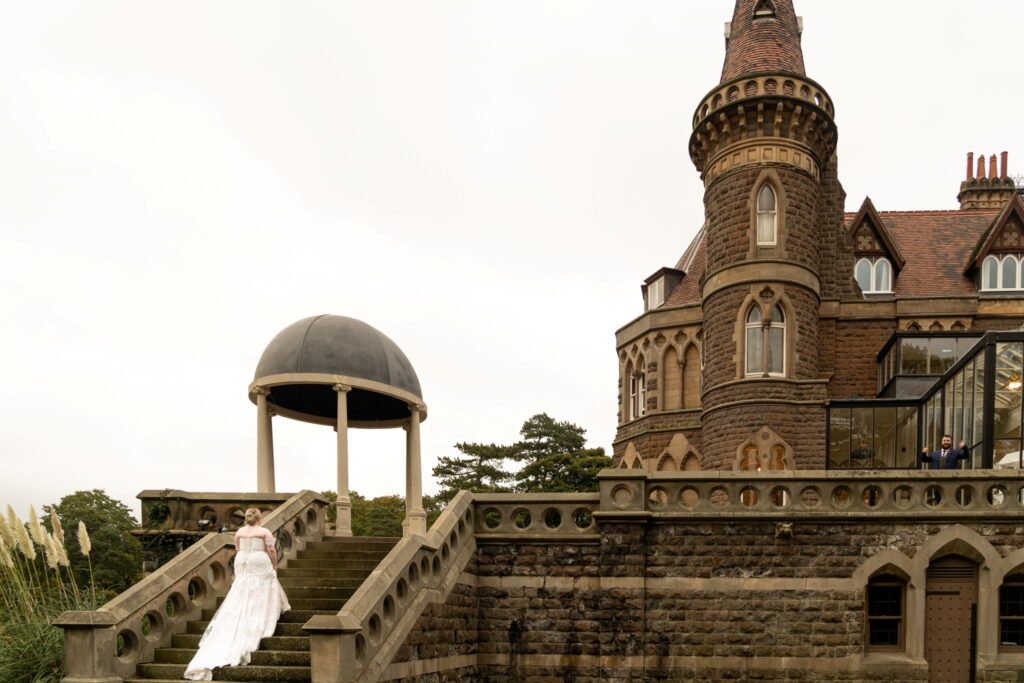 24 bride climbs terrace steps rushpool hall saltburn-by-the-sea oxford wedding photography