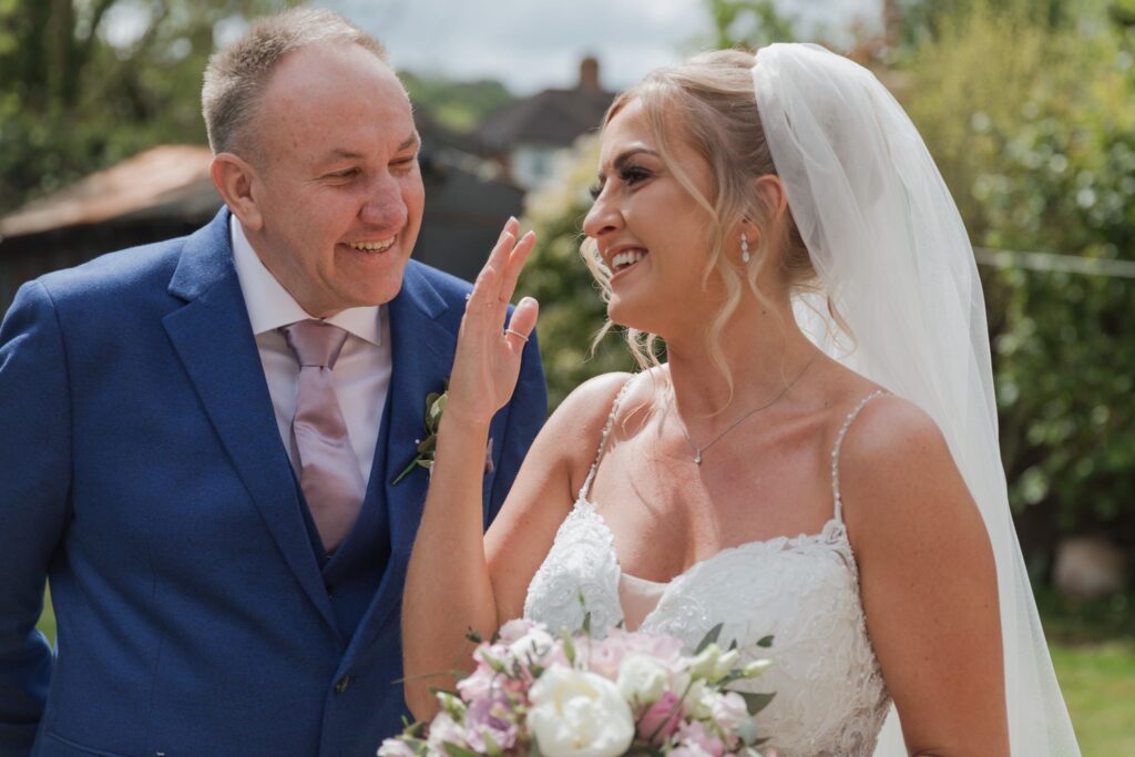 35 laughing father of bride and daughter oxford oxfordshire wedding photographers