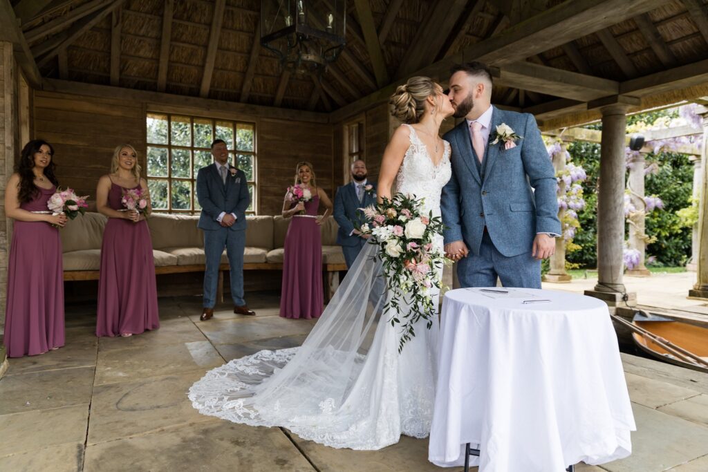 64 bride groom kiss register signing ceremony euridge manor chippenham wiltshire oxfordshire wedding photography