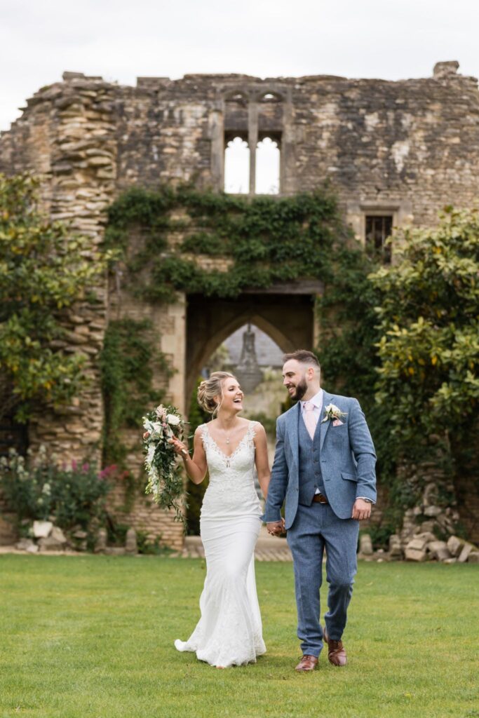 73 laughing bride groom strolling euridge manor grounds chippenham wiltshire oxford wedding photography
