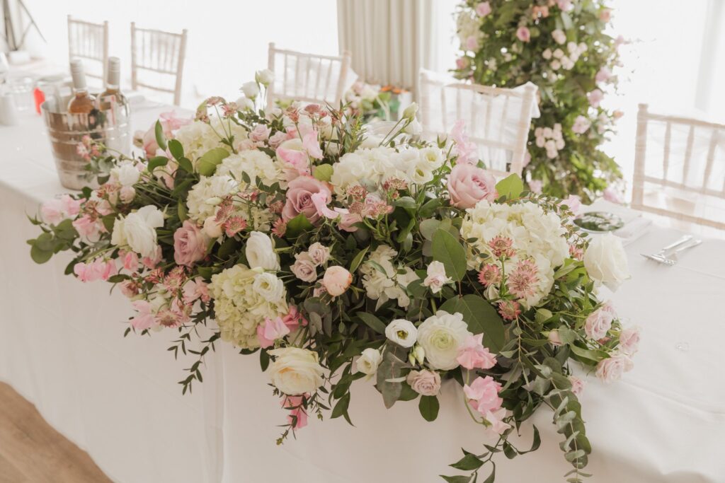 80 top table floral arrangement cotswolds hotel reception marquee chipping norton oxfordshire wedding photography