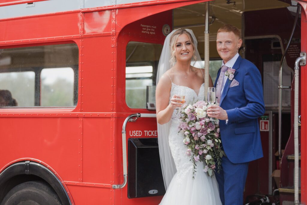 85 bride grooms red london bus portrait cotswold hotel chipping norton oxfordshire wedding photographers