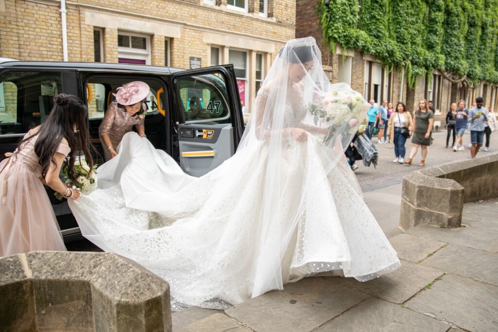 bridal party exists taxi wesley memorial church oxford oxfordshire wedding photographers
