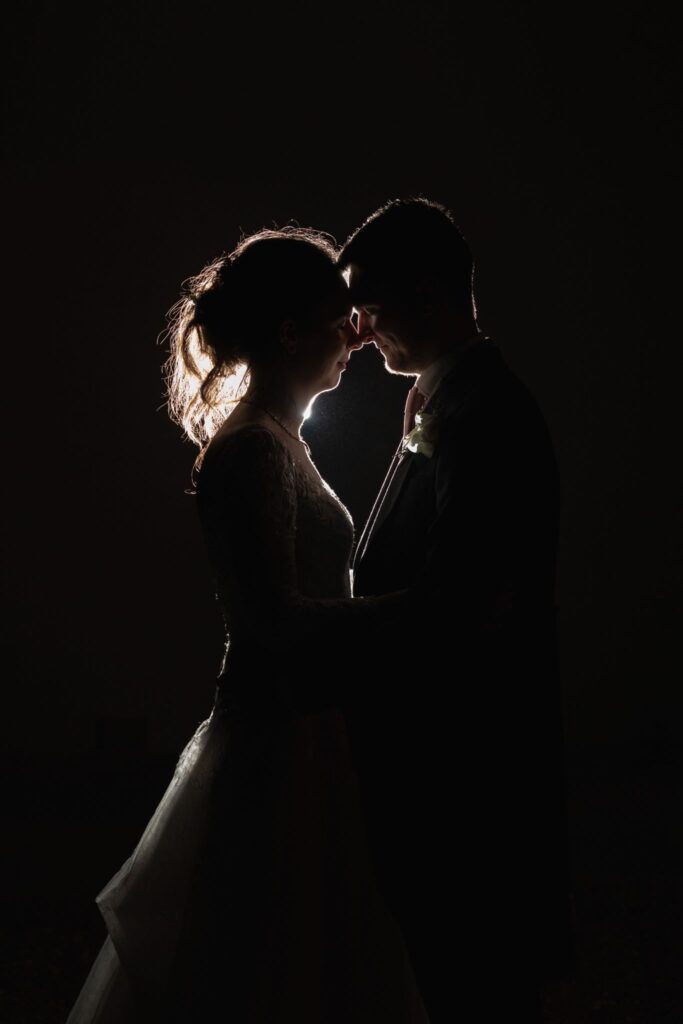 150 bride grooms silhouette prestwold hall courtyard leicestershire oxfordshire wedding photographers