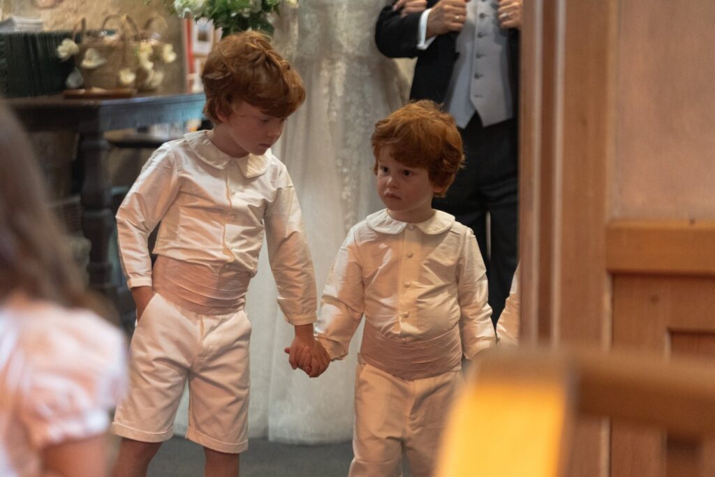 62 page boys hold hands st andrews church ceremony prestwold loughborough oxford wedding photography