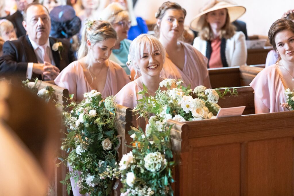 70 bridesmaids hear marriage ceremony st andrews church prestowold leicestershire oxfordshire wedding photographers