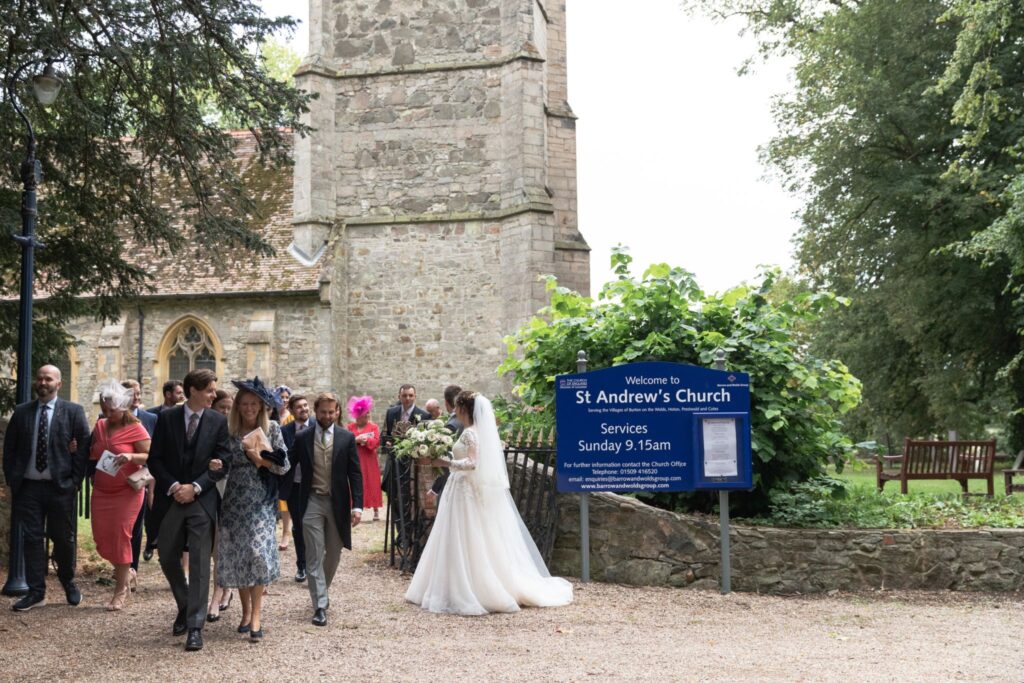 91 guests leave st andrews churchyard prestwold leicestershire oxford wedding photographers