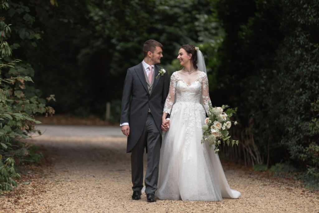 94 bride groom stroll alone prestwold hall grounds loughborough oxfordshire wedding photographers