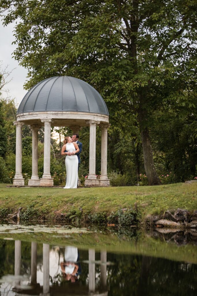 102 bride groom kiss ardington house garden dome wantage oxfordshire oxford wedding photographers