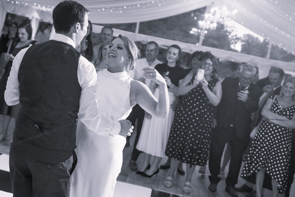 110 guests watch first dance ardington house marquee wantage oxfordshire wedding photographer