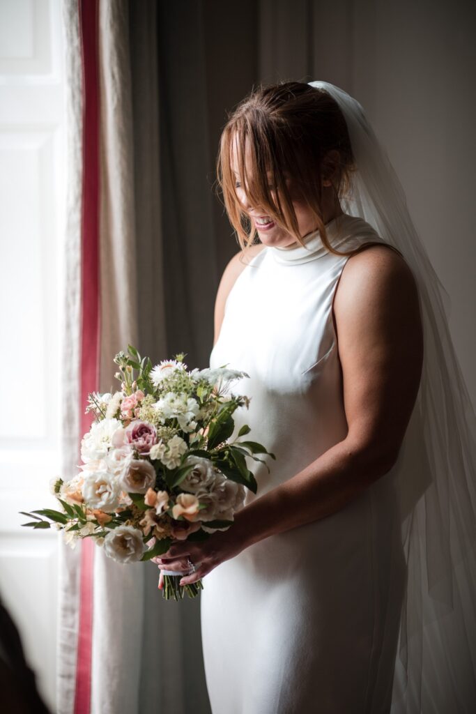 24 bride holds bouquet ardington house wantage oxfordshire wedding photography