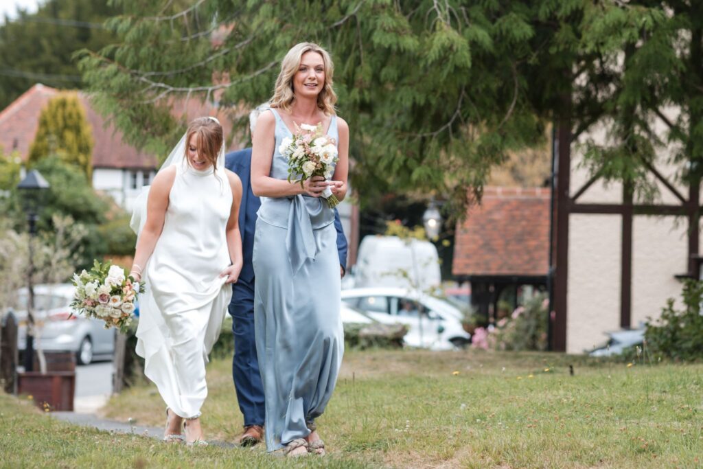 32 bride approaches holy trinity church ardington wantage oxfordshire wedding photographers