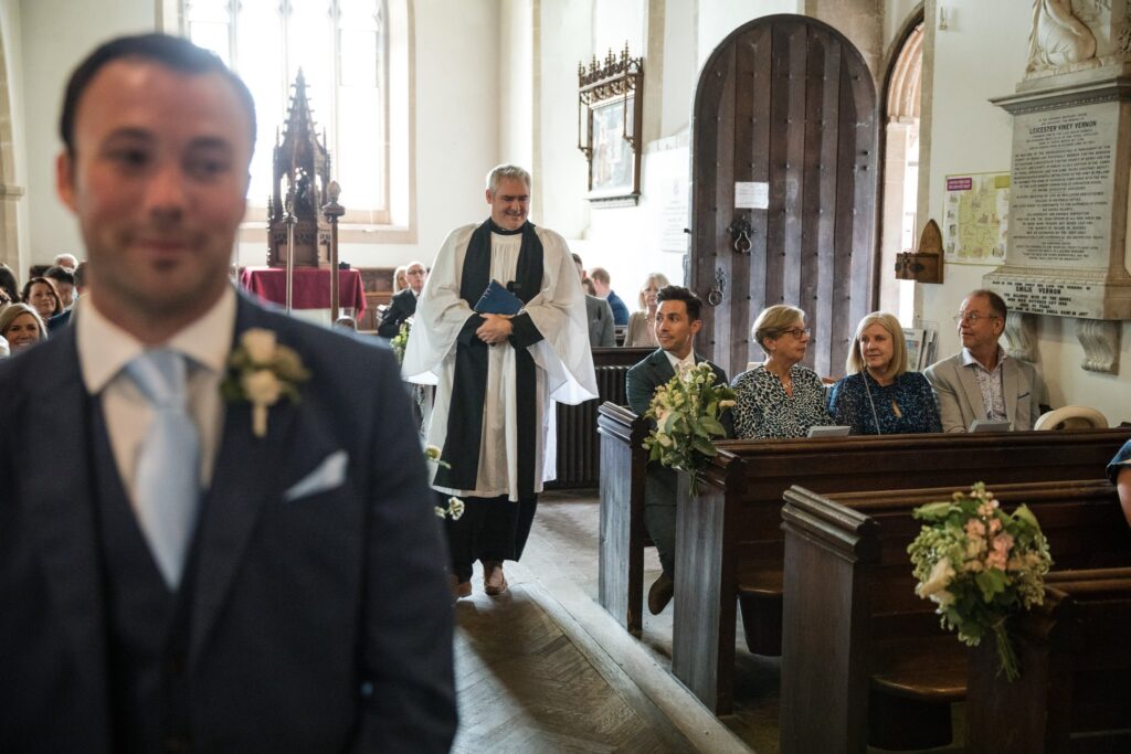 35 priest enters holy trinity church ardington wantage oxfordshire wedding photography