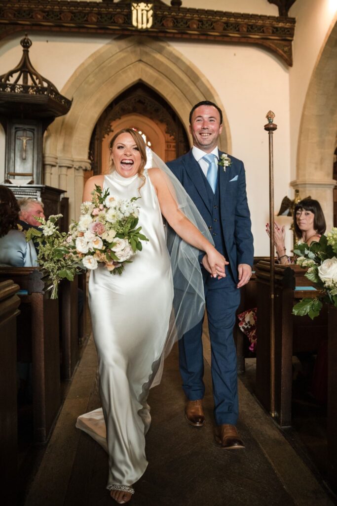 47 bride groom aisle walk holy trinity church ardington wantage oxfordshire wedding photography