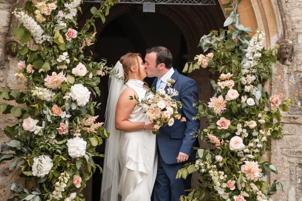 48 bride groom kiss holy trinity church archway ardington wantage oxfordshire oxford wedding photographer