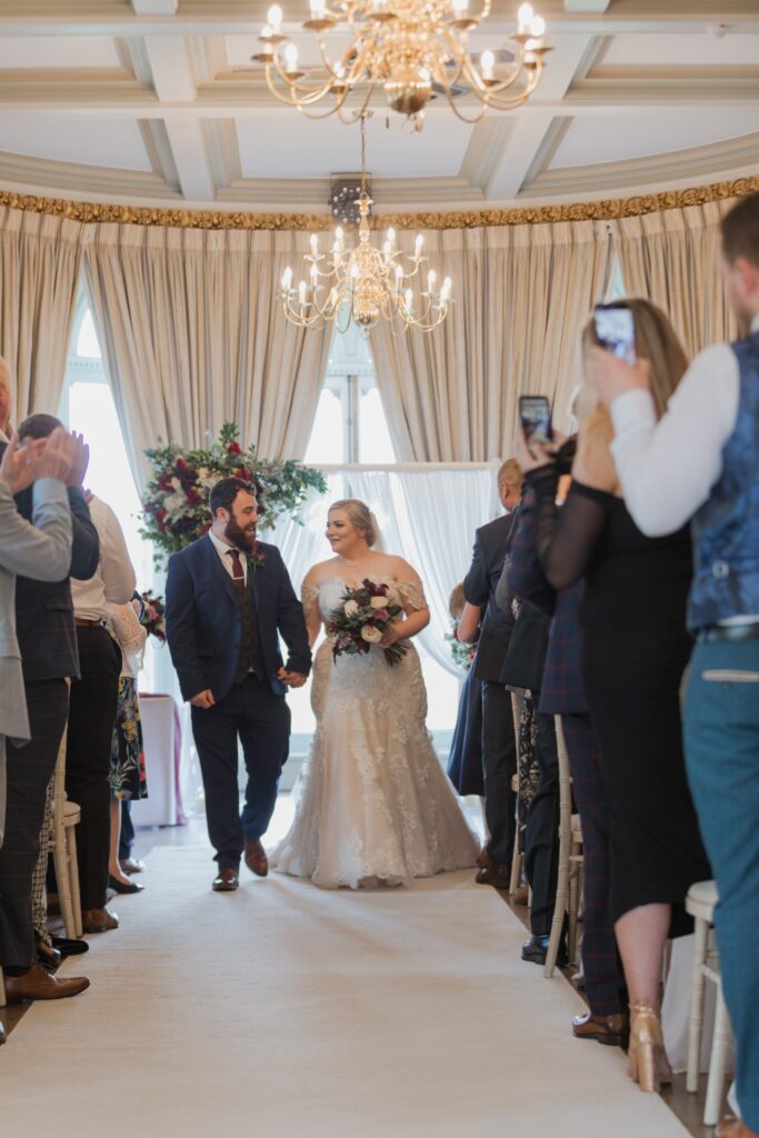 049 guests photograph bride grooms aisle walk rushpool hall saltburn north yorkshire oxfordshire wedding photographers