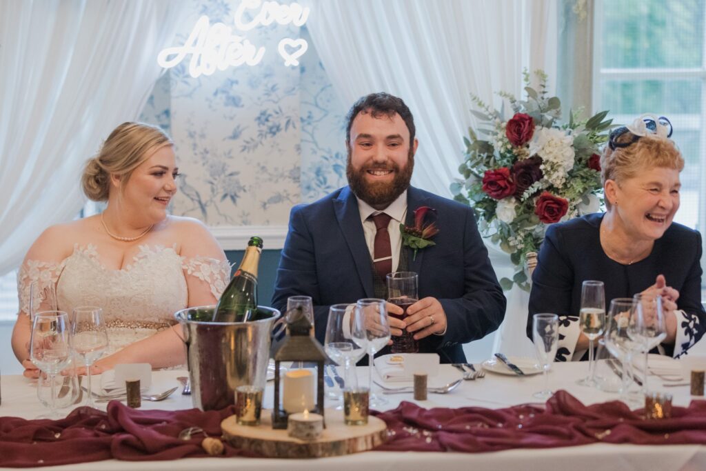 066 smiling bride groom enjoy rushpool hall reception saltburn north yorkshire oxfordshire wedding photographer